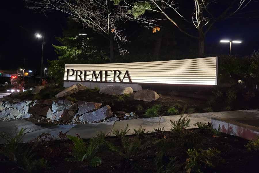 Modern Curved Steel Sign Welcomes Visitors to Premera Campus
